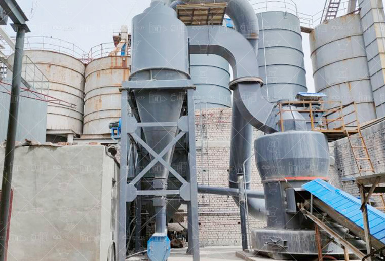 Modern control room with digital displays monitoring a grinding mill operation in real-time.